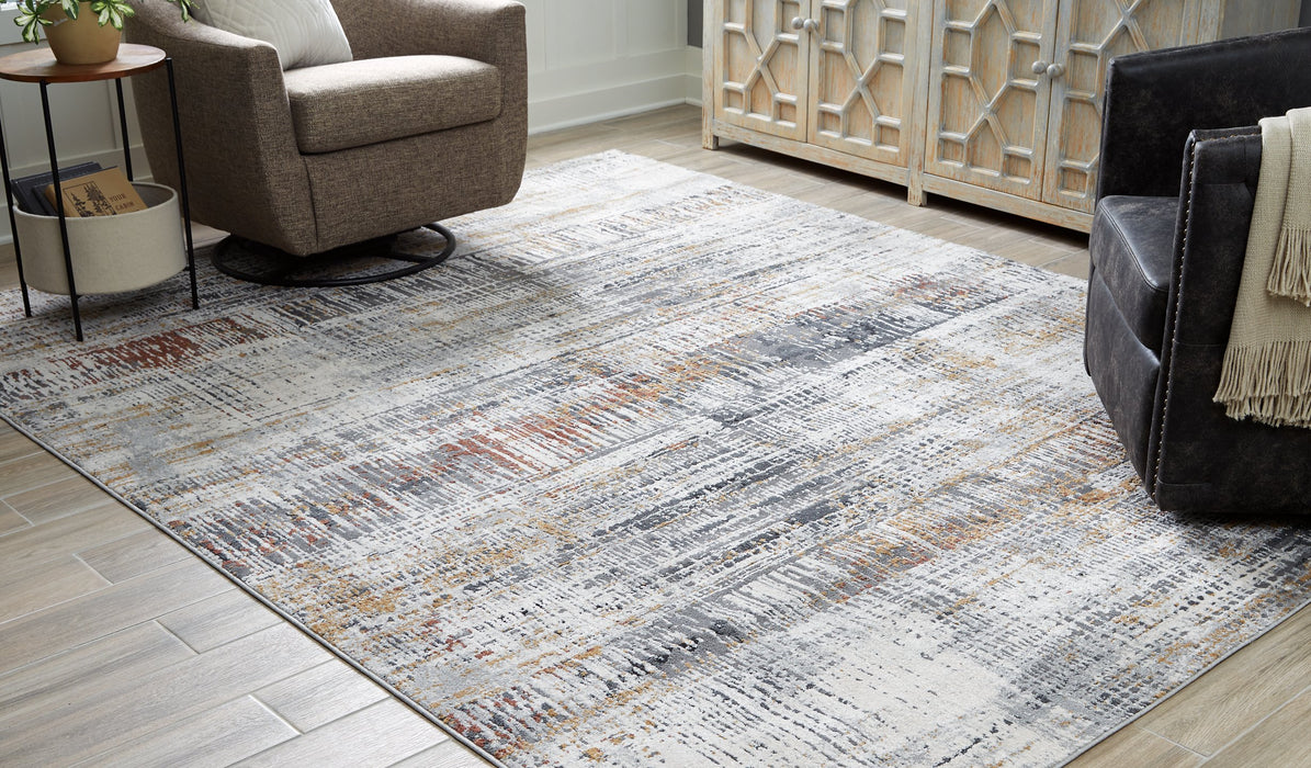 Rhettner 7'10" x 9'10" Rug - LasVegasFurnitureOnline.com